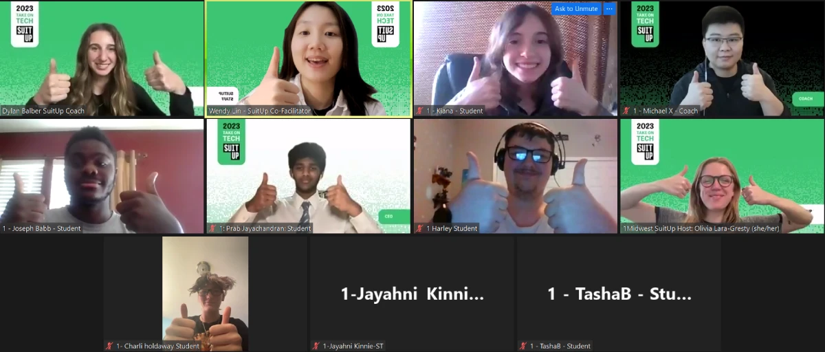 A virtual meeting screenshot with nine diverse individuals, each smiling and giving a thumbs-up gesture. The background is green with "2023 Tech Suit Up" logos, conveying a positive and encouraging atmosphere.