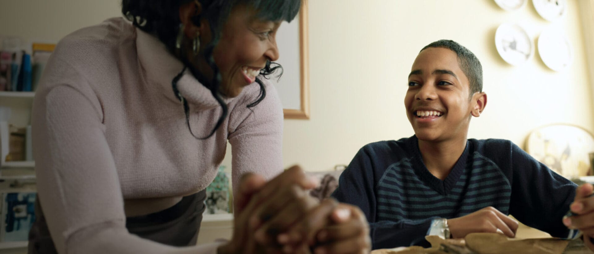 mom and son laughing